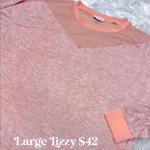 LuLaRoe “Lizzy” lightweight pretty sweater. Stretchy waistband.  Fast shipper.